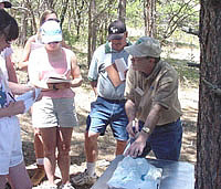 Participants go over over an activity during a Fremont TEN workshop.