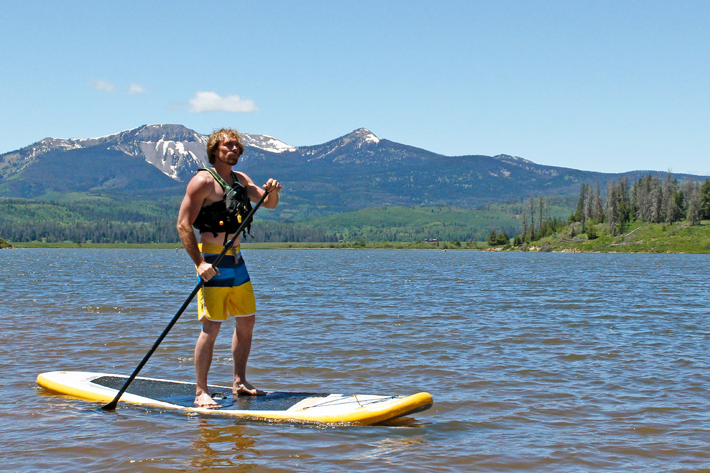 guy standing on hydrus paddleboard