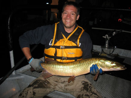 researcher holding fish