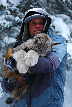  Eric Newkirk holding a lynx