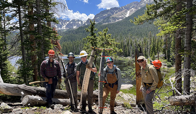 Volunteers cleared trails in Indian Peaks Wilderness. Trees were downed by beetle-kill epidemic & recent avalanche activity.