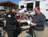 Ranger providing information to camper