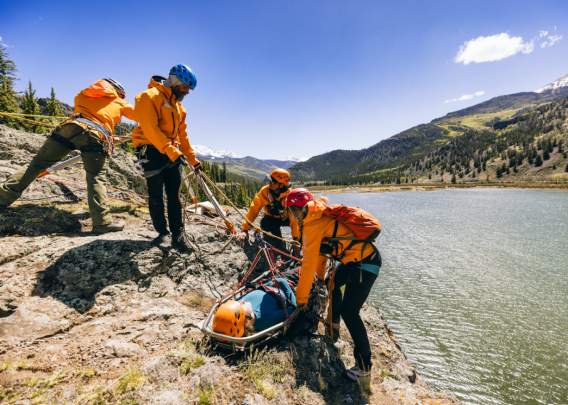 Search and rescue team helps woman up mountain ledge