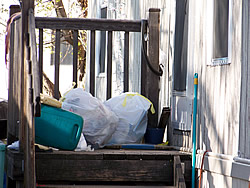 Trash bags stored outside—bears can't resist checking them out. Photo © CDOW/A. Ryel.