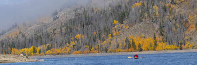 Kayaker in fall at Lake Granby