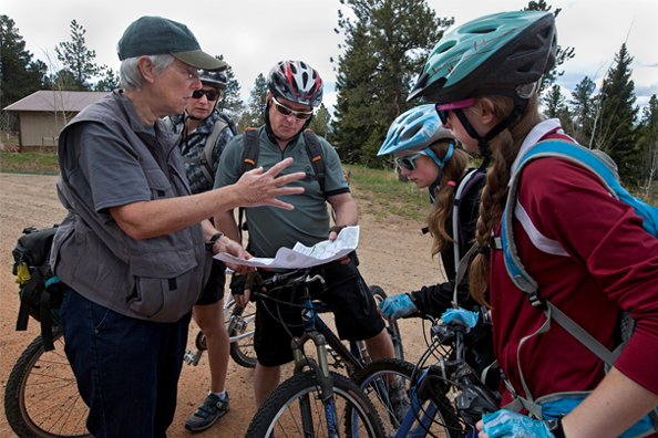 Mountain bikers discussing trail options at Staunton State Park. Photo by Ken Papaleo.