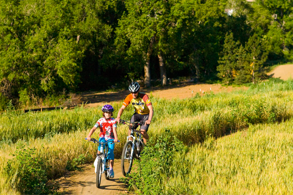 A family riding a trail at the Valmont Bike Park. Photo courtesy of the Valmont Bike Park.