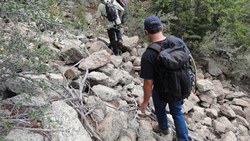 Two hikers on rocky trail - photo 5