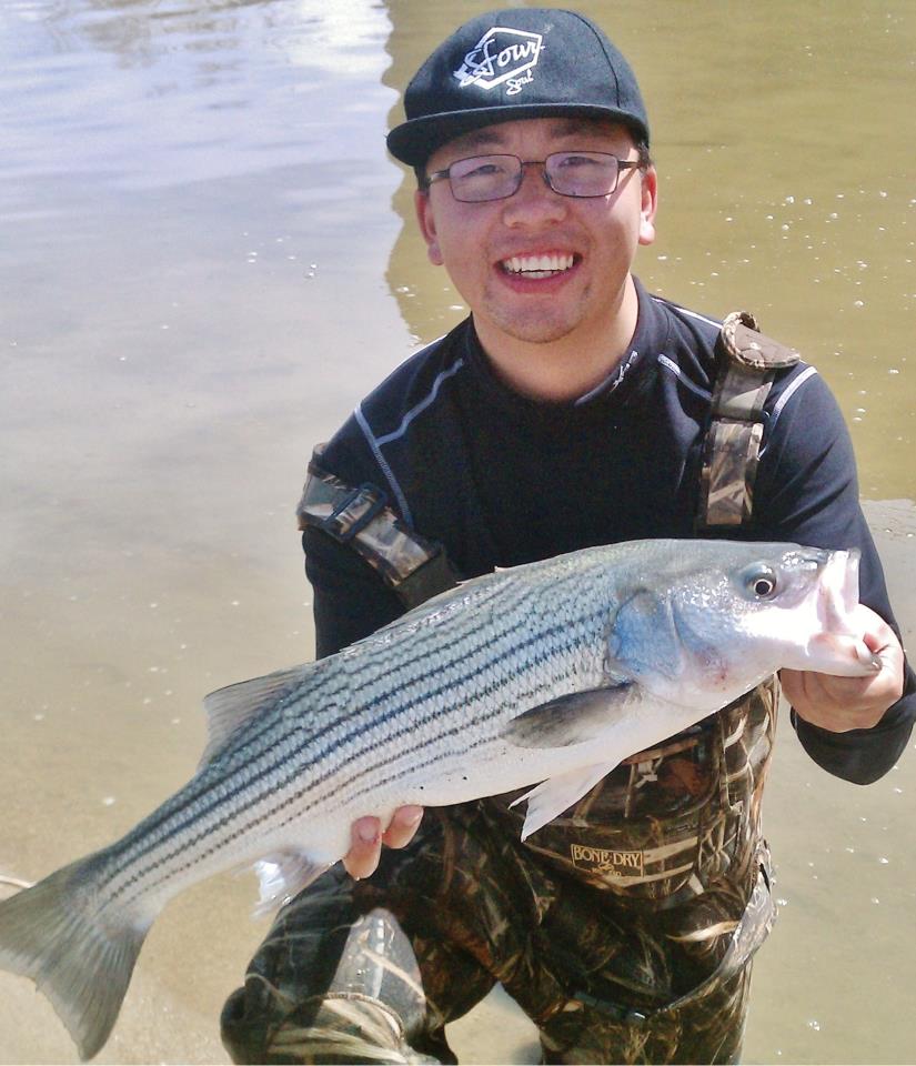 Angler with striper caught at Ser Her Spillway